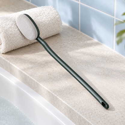 Bath pad resting beside a plain towel on a bath ledge